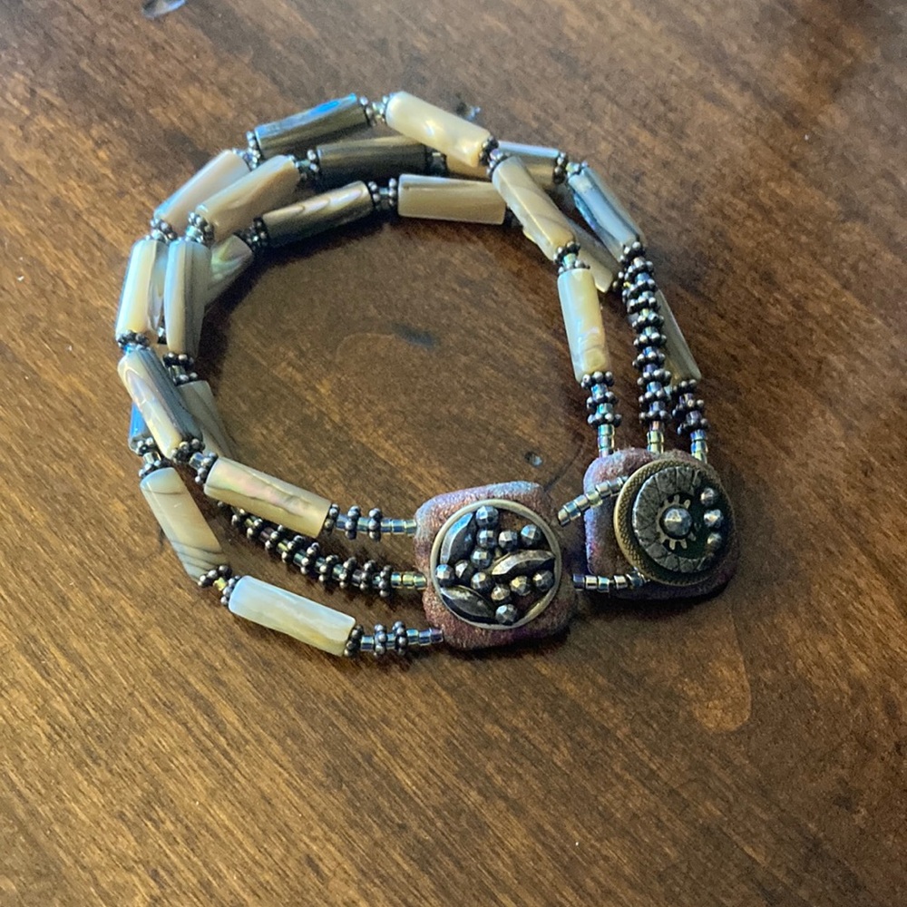Brown and Tan Multi-Strand Bracelet with Tribal Design